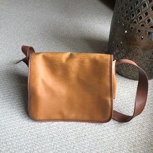 Tan leather vintage messenger bag